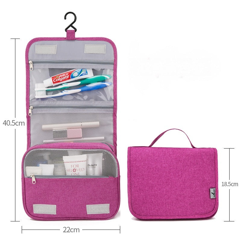 Pochette murale de rangement rose avec dimensions : 40,5 cm ouverte, 22 cm de large, 18,5 cm repliée, contenant des produits de toilette